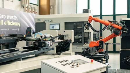 Example of a work cell with tube bender, automatic loader, and robotic unloading system