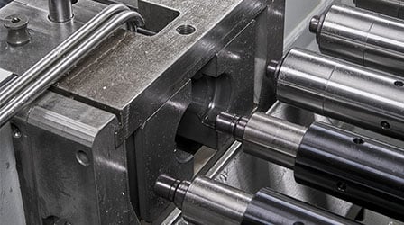 Retractable dual clamp on CNC tube end-forming systems