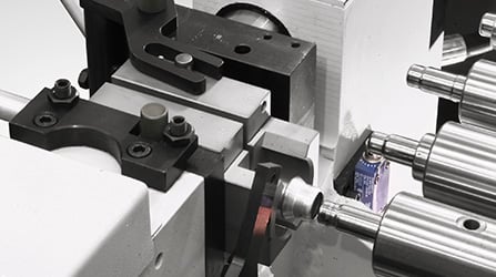 Tube end-forming machine clamp  