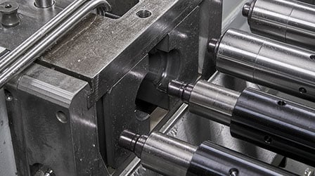 Retractable dual clamp on CNC tube end-forming systems