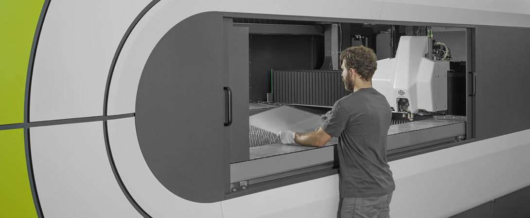 Sheet metal laser cutting machine with side access doors.