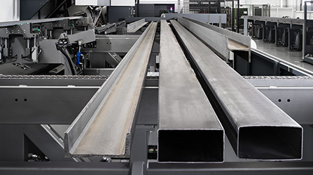 Automatic loader for tube lasers