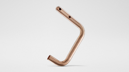 Gebogenes und umgeformtes Rohr mit Bohrungen