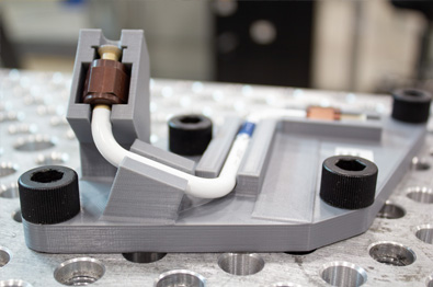 Aluminum alloy tube on comparison fixture for next-generation fighter aircraft.