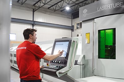 Tuba Inc. operator in front of the LT7 Lasertube system